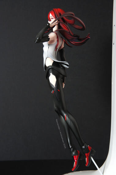 The cape is removable and can be displayed with or without.